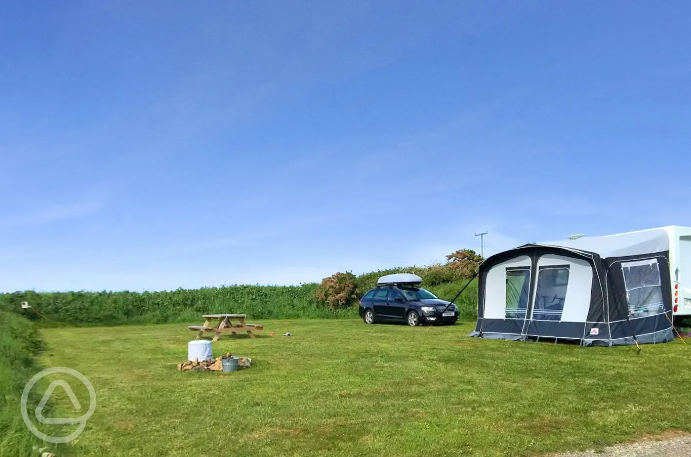 Campervan on grass pitches with awning space and optional electric