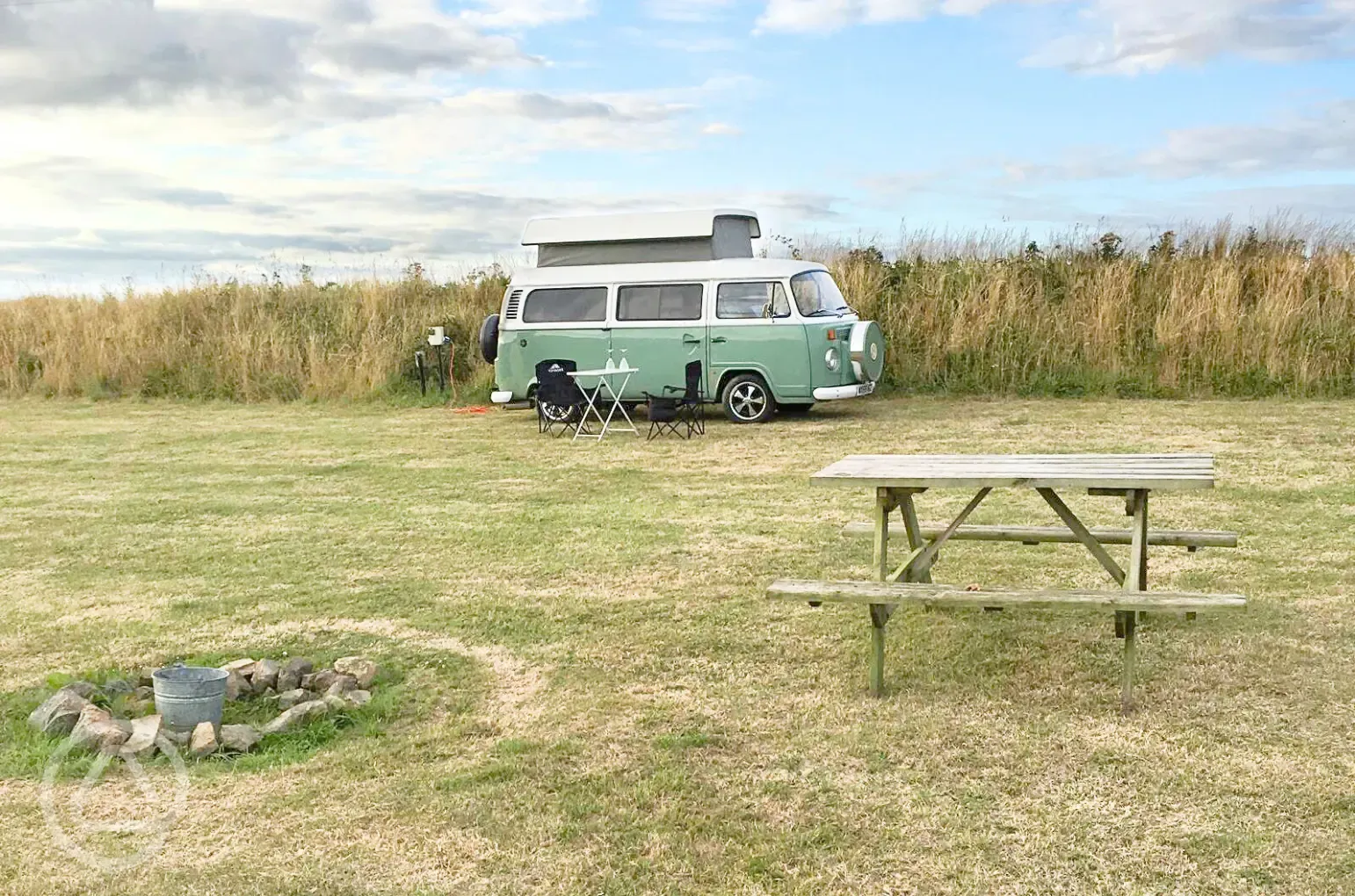 Campervan on grass pitches with awning space and optional electric