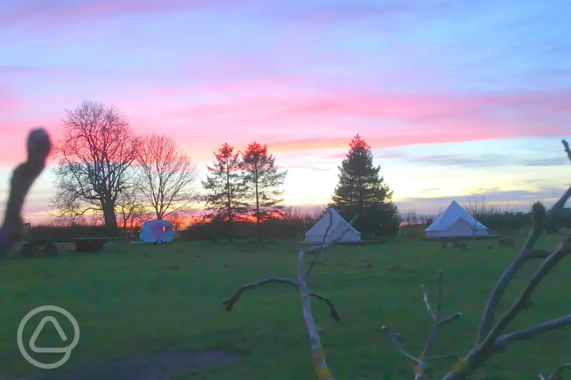 Glamping Thorpe at night in bell tents