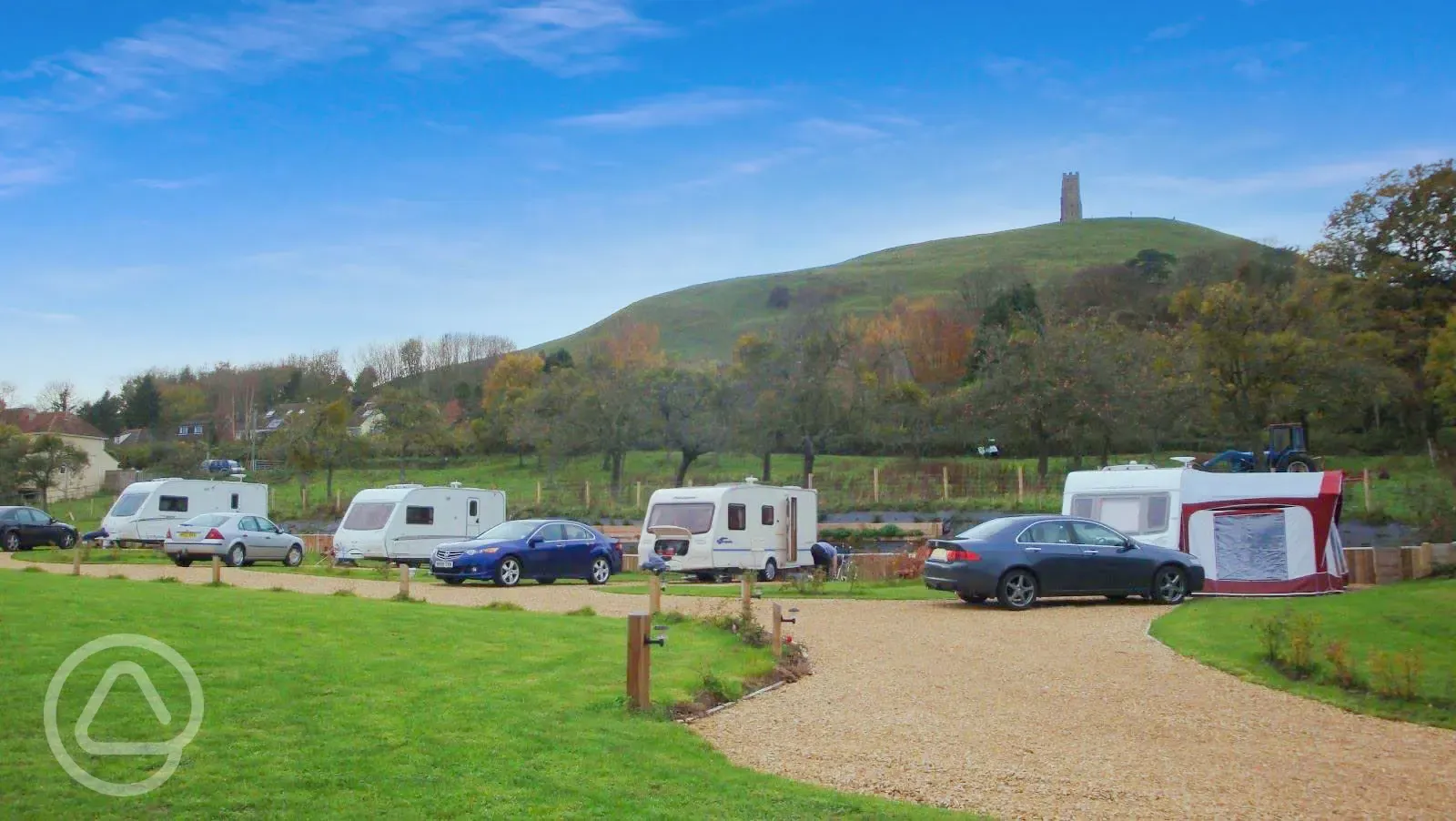 Electric hardstanding pitches with views of the Glastonbury Tor