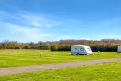 Grass pitches with an electric hook up at Weston Caravan and Campsite