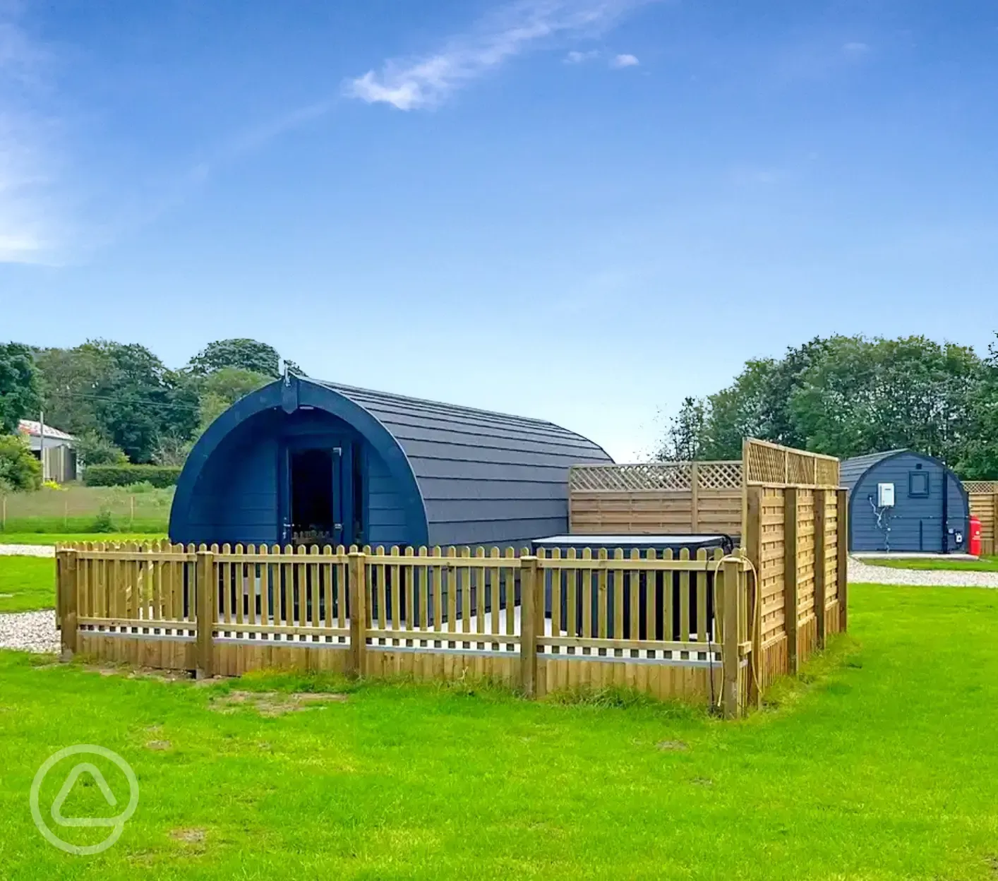 Ensuite glamping pods with fenced-off private decked areas and hot tubs