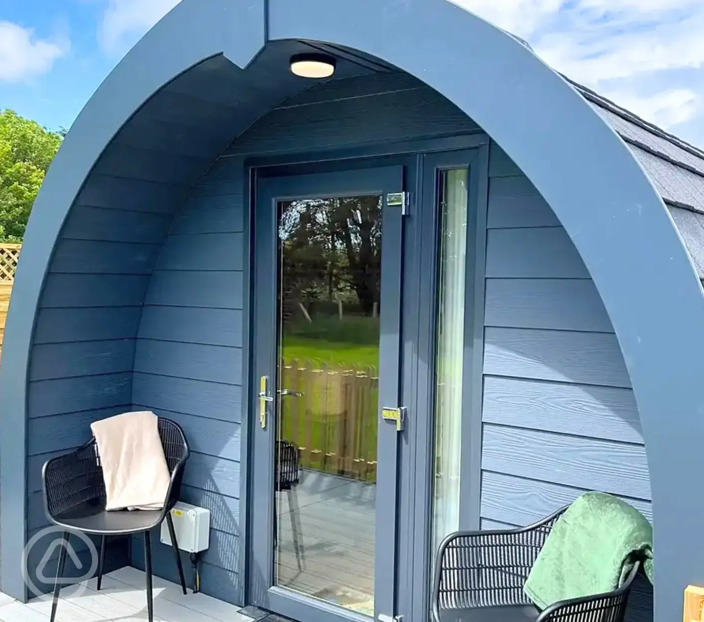 Glamping pod with lockable glass front doors