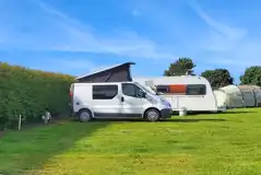 Grass pitches with 16 amp electric hook ups at Graffitoe Farm Grass pitches with 16 amp electric hook ups at Graffitoe Farm