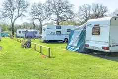 Hardstanding pitches with awning space (9m x 9m) Hardstanding pitches with awning space (9m x 9m)