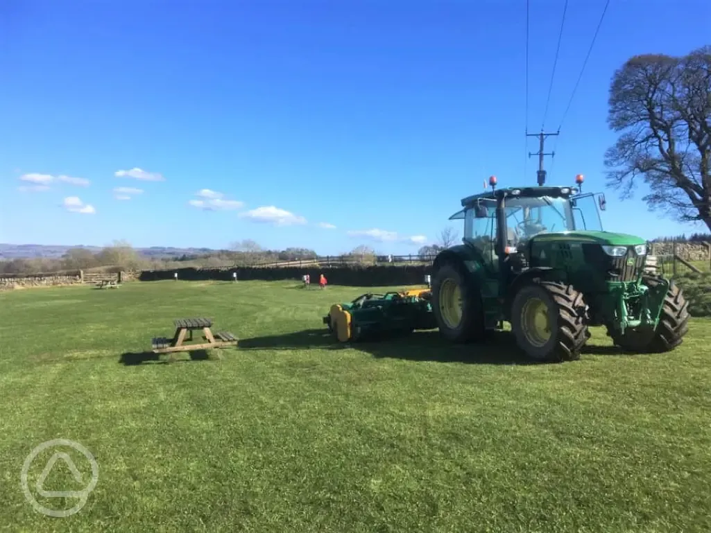 Tractor on the grass pitches
