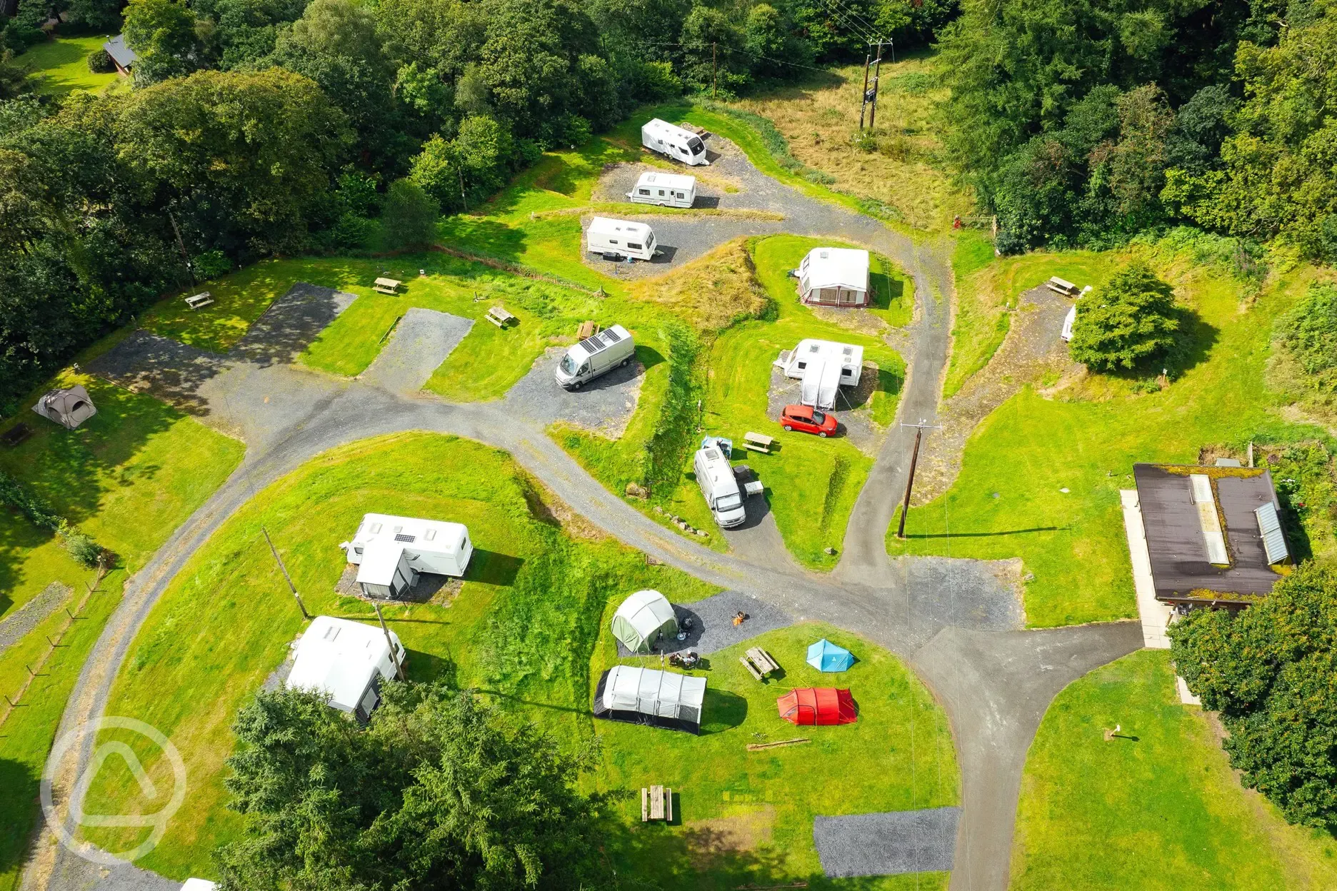 Aerial of the fully serviced hardstanding touring pitches