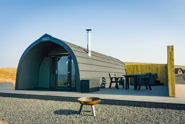 Castle glamping pod with a private hot tub and patio