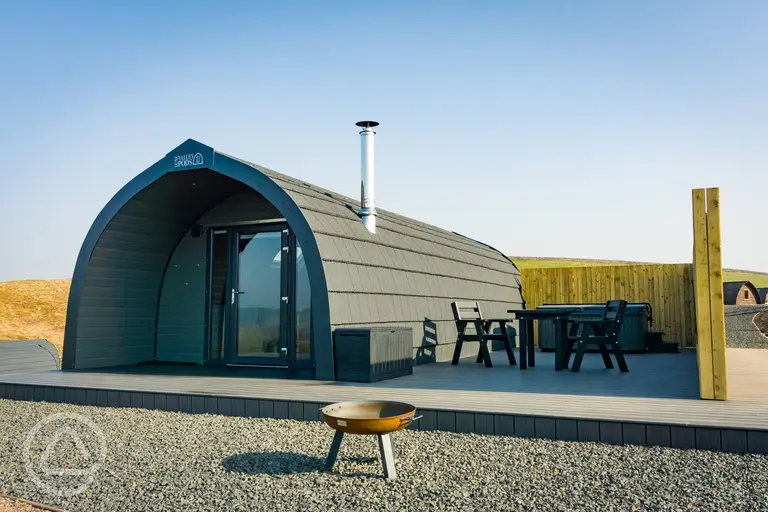 Castle glamping pod with a private hot tub and patio