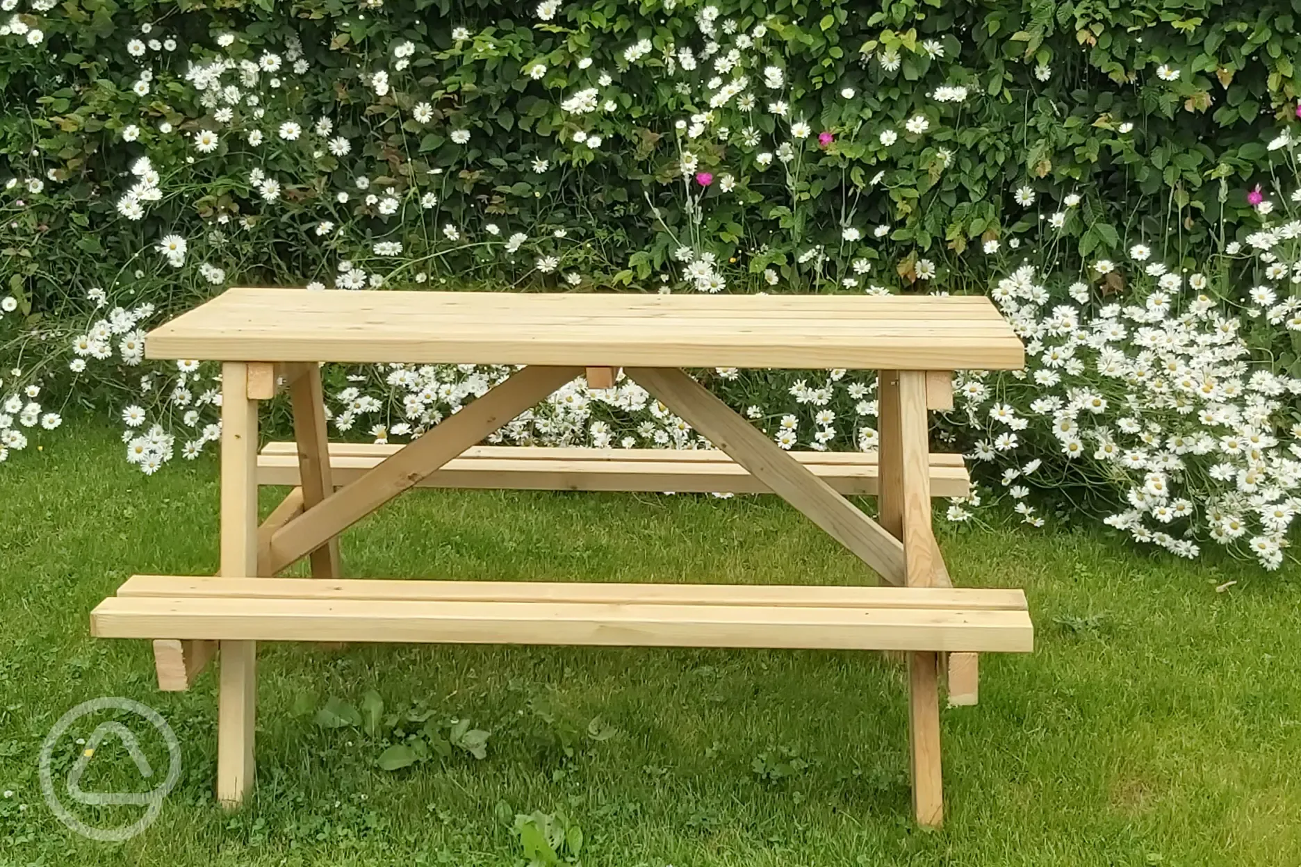 We have locally built wooden picnic benches for hire