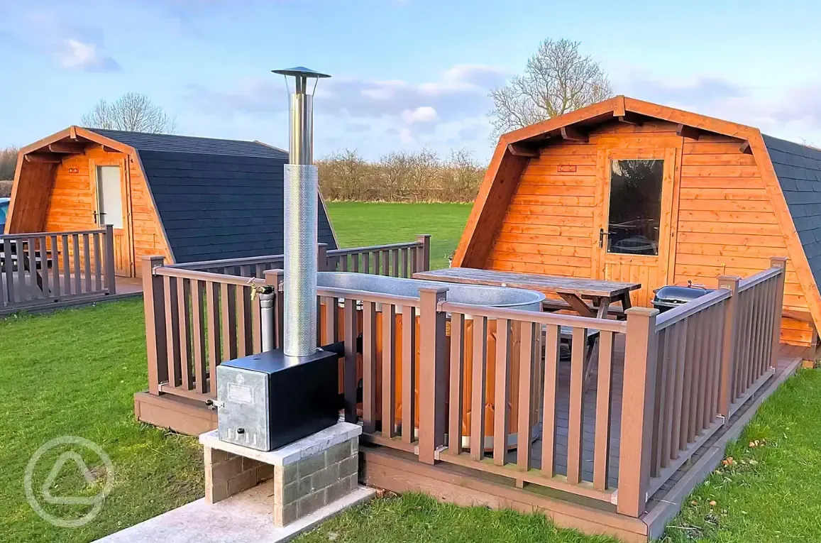 Standard glamping pods with hot tubs