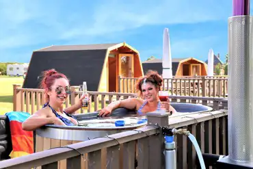 Plus camping pods with hot tubs at Hill Farm Caravan and Camping Site