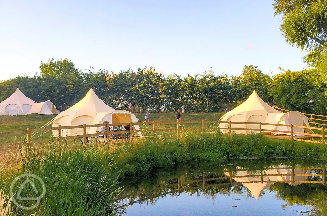 Lotus Belle Tents by the pond