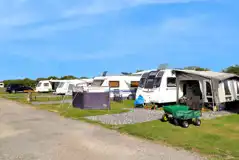 Fully serviced hardstanding pitches measuring 10m by 10m with 16 amp electric Fully serviced hardstanding pitches measuring 10m by 10m with 16 amp electric