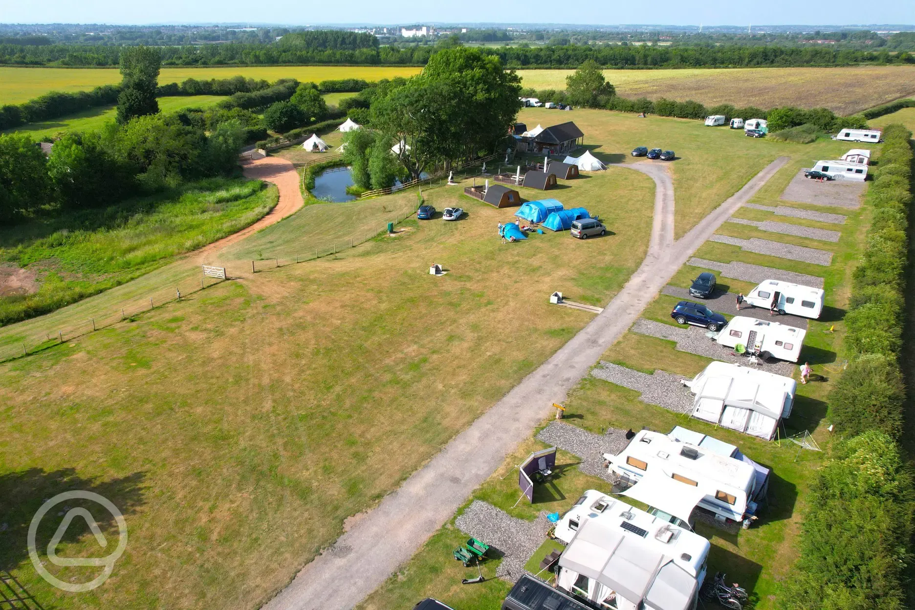 Aerial of the grass and hardstanding camping pitches