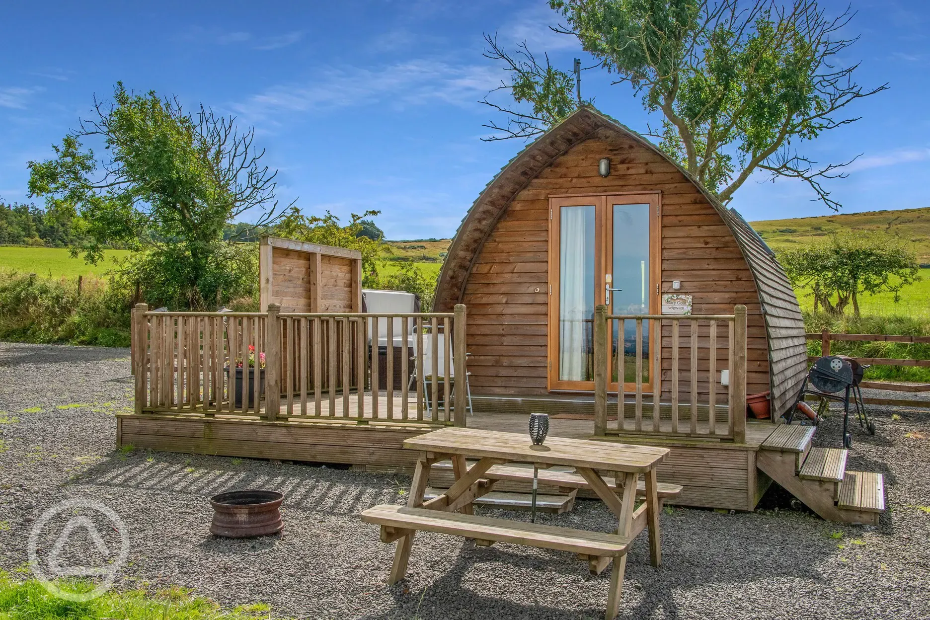 Deluxe Wigwam pods with hot tubs