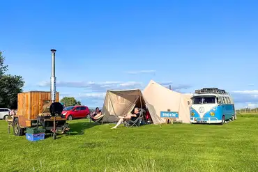 Non electric grass pitches (with wood-fired hot tubs to hire onsite)