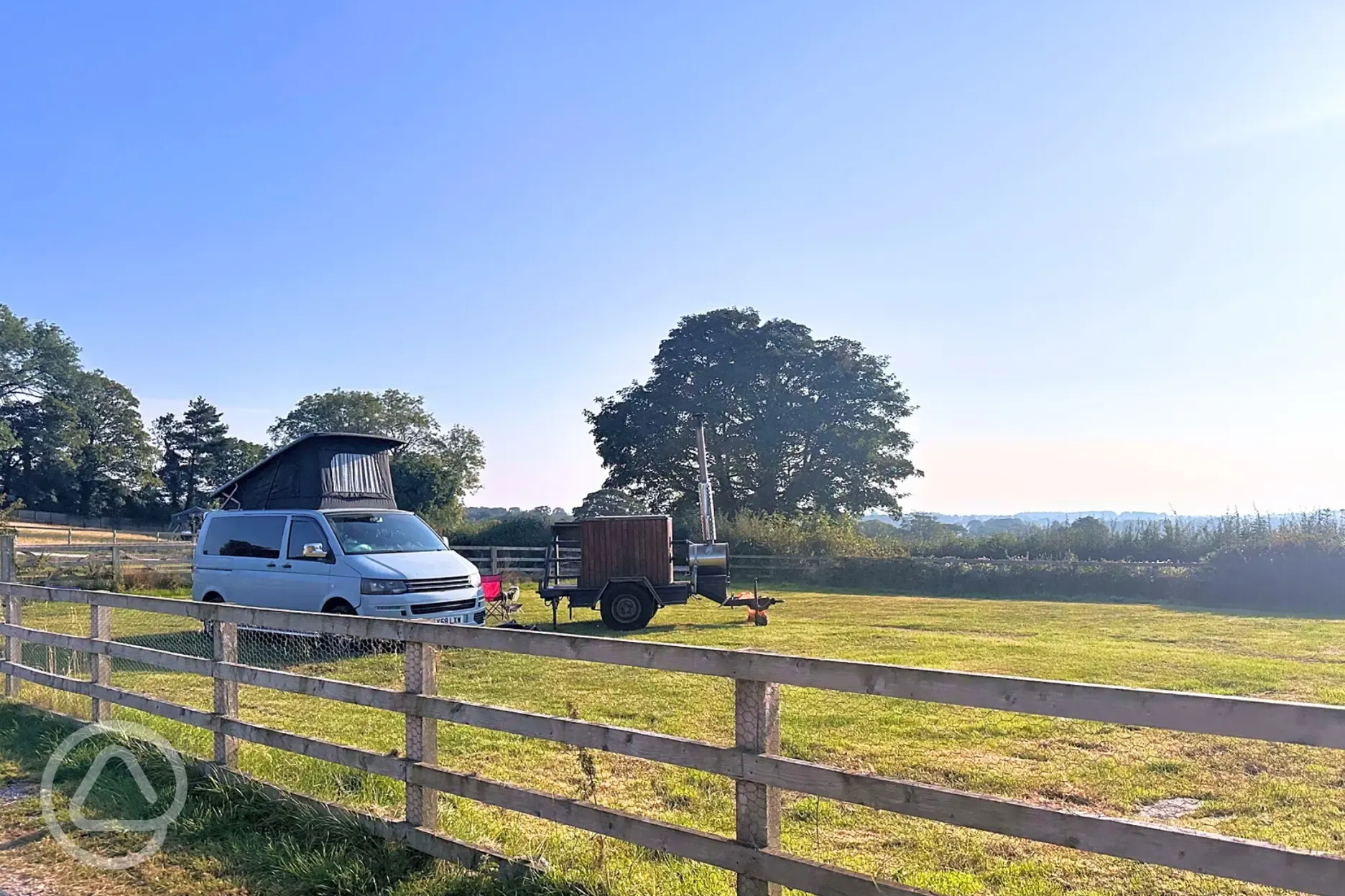 Enclosed, secure dog friendly pitch with water