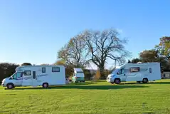 Electric grass pitches with 9 amp hook ups Electric grass pitches with 9 amp hook ups