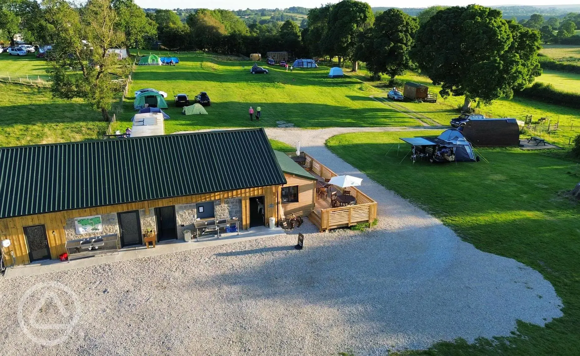 Facilities block and cafe with an outdoor seating area