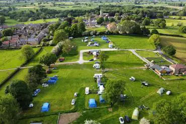 Aerial of Ivy Bank Staycation with Kirkby Malzeard village in the background