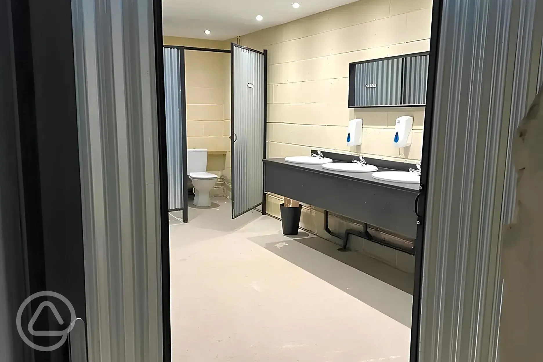 Facilities with 16 flushing toilets and ten showers