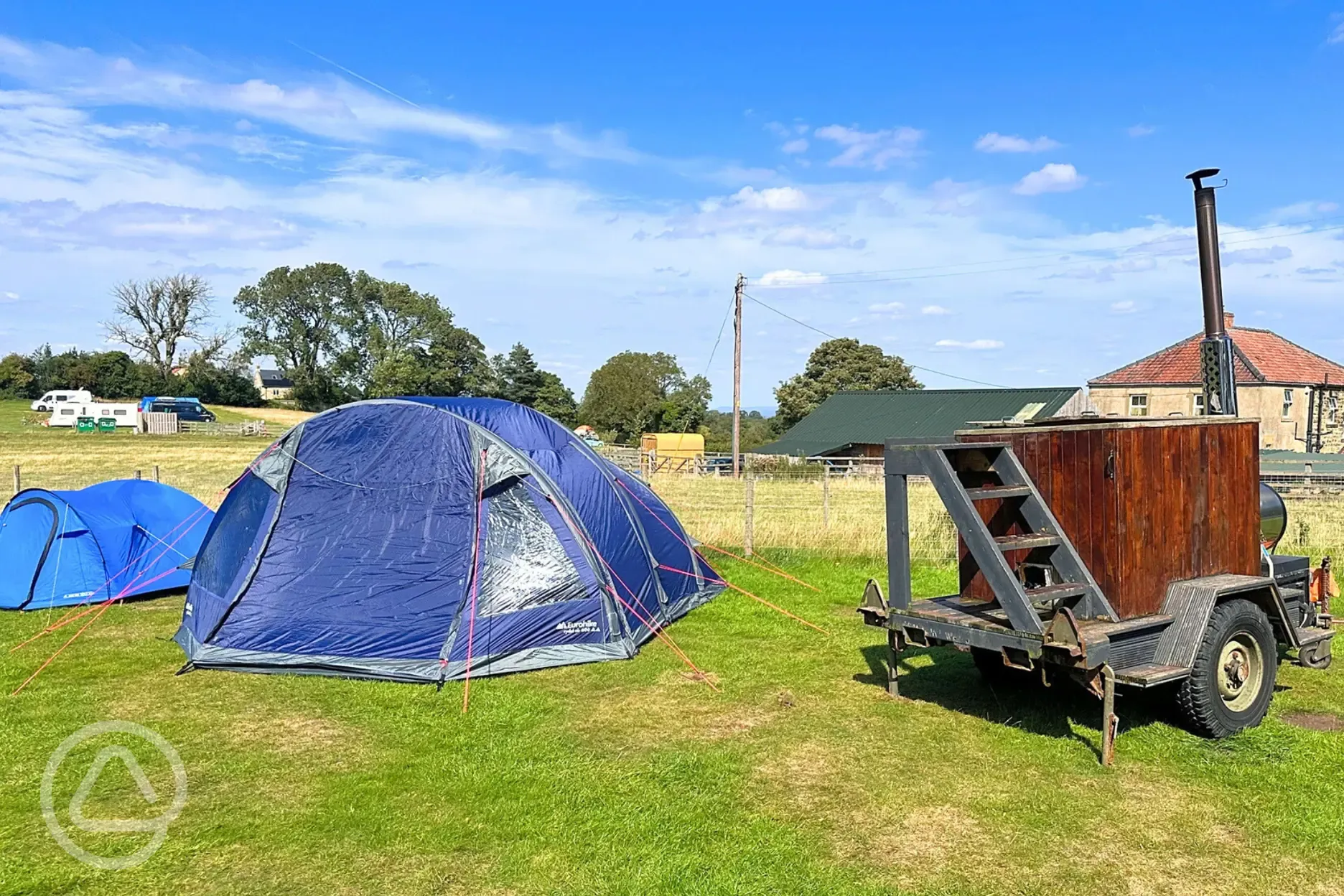 Non electric grass pitches (with wood-fired hot tubs to hire onsite)