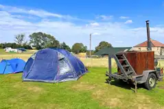 Non electric grass pitches (with wood-fired hot tubs to hire onsite) Non electric grass pitches (with wood-fired hot tubs to hire onsite)