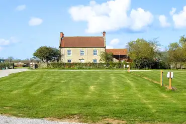 Electric grass pitches (5m x 9m) with 10 amp hook ups