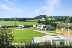 View to the hardstanding pitches with farmland views