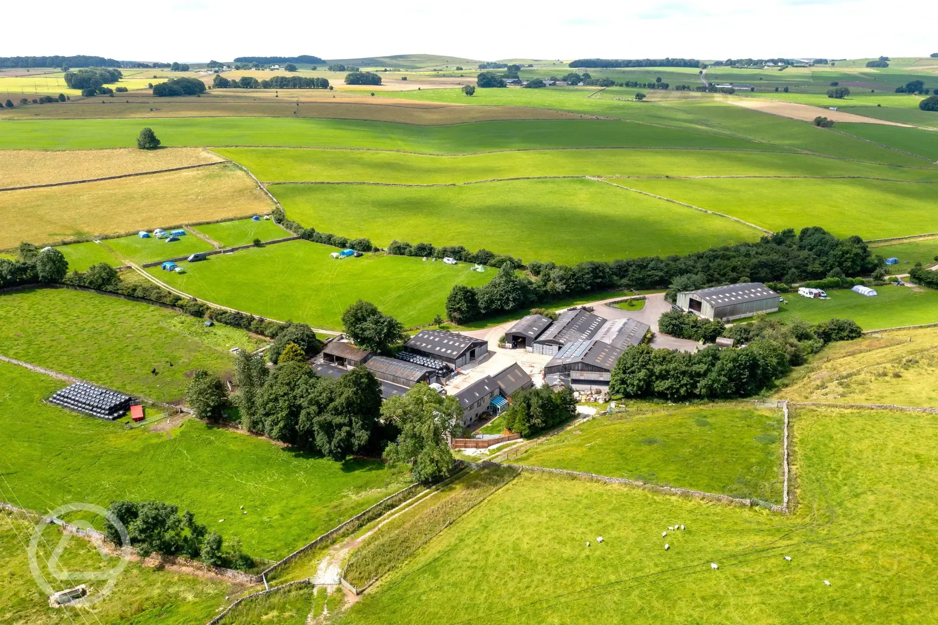 Aerial of Knotlow Farm, surrounded by countryside in the Peak District
