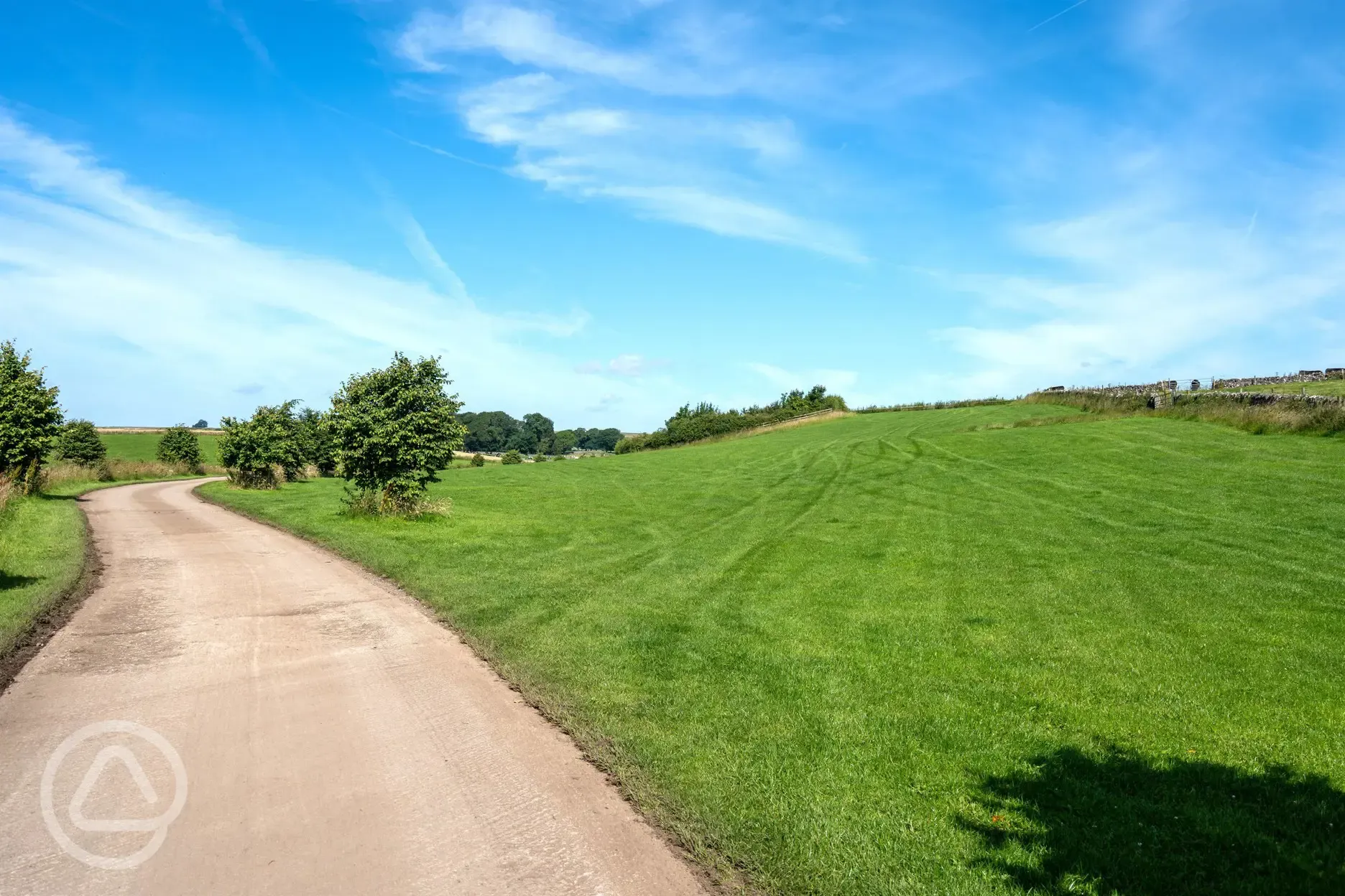 Adult only camping field with unmarked pitches for tents and trailer tents