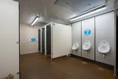 Toilets with cubicles and urinals Toilets with cubicles and urinals