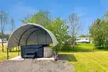 Hardstanding pitches with hot tubs measuring 9m by 5m
