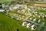 Aerial of the pitches and surrounding countryside at Lady Heyes Holiday Park
