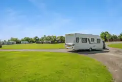 Serviced touring pitches measuring 9m by 5m with electric and fresh water Serviced touring pitches measuring 9m by 5m with electric and fresh water