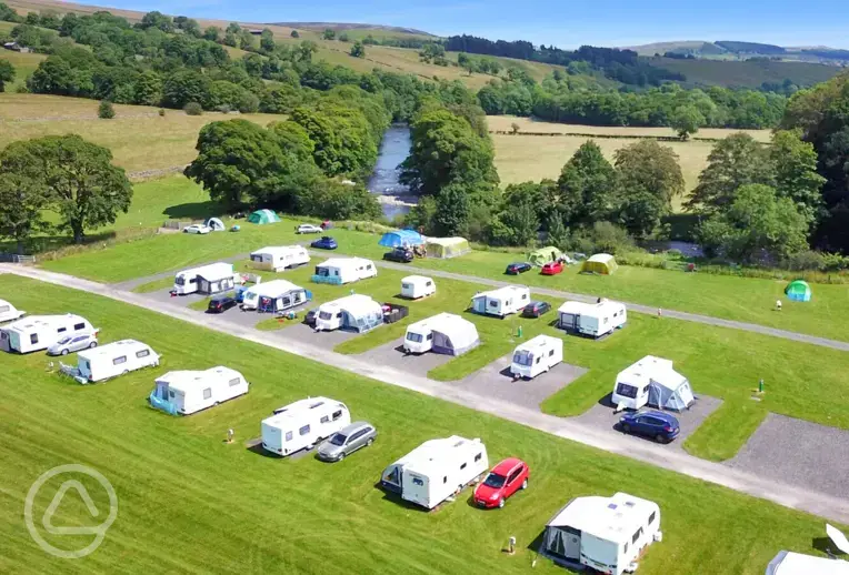 Aerial of electric hardstanding and grass pitches