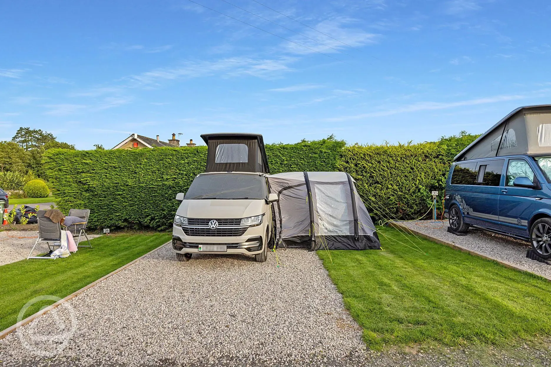 Electric hardstanding touring pitches with space for a standard awning