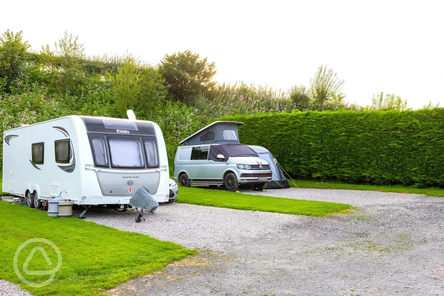 Electric hardstanding touring pitches with space for a standard awning