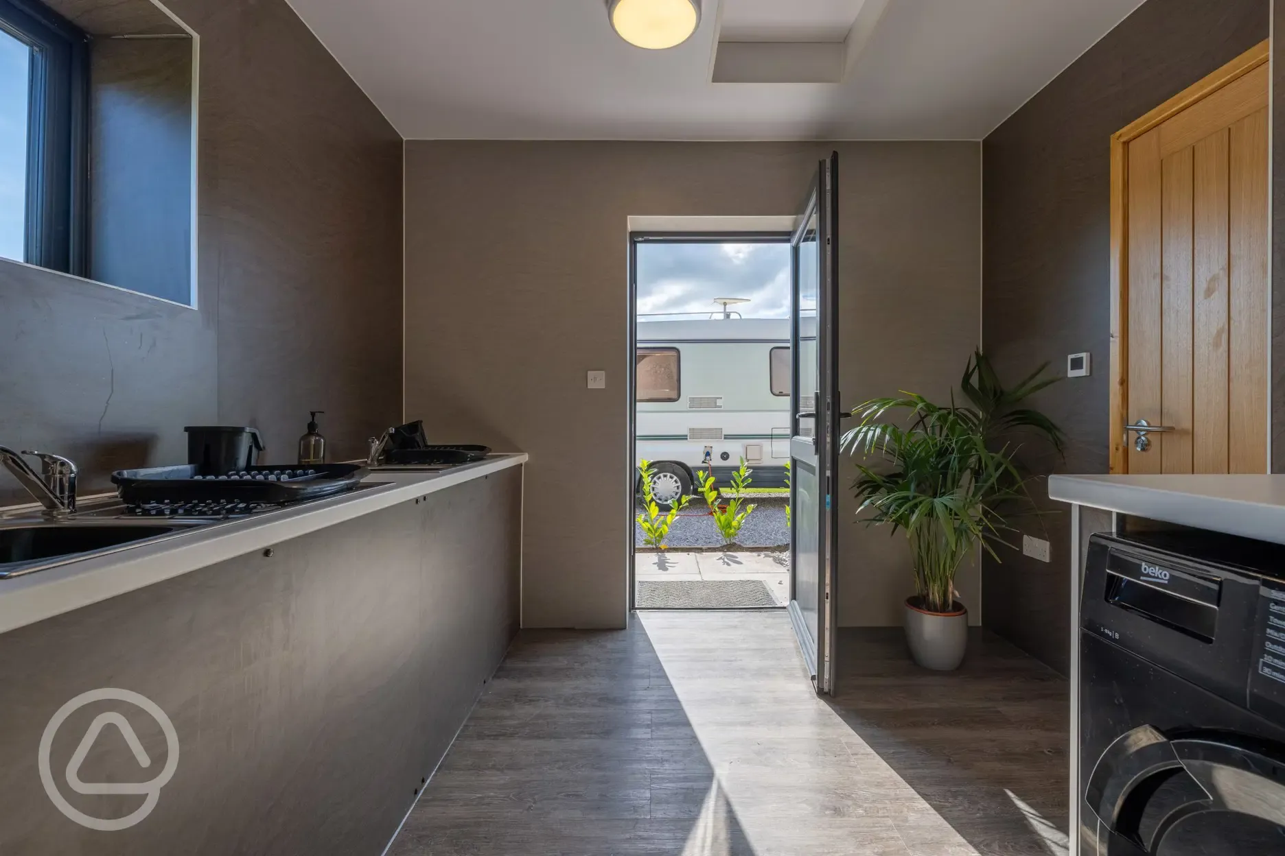 Laundry room and indoor washing up area
