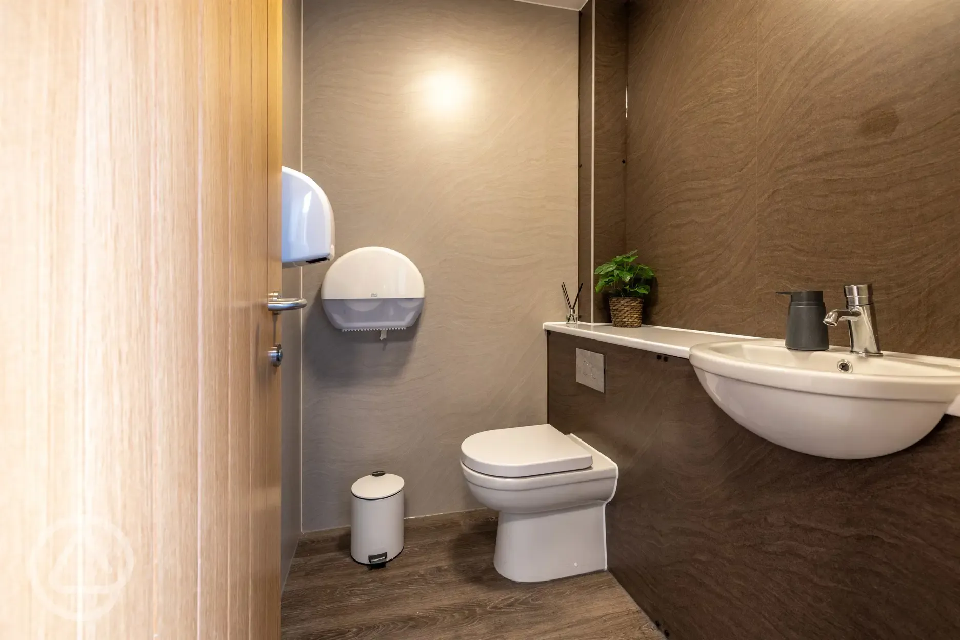 Individual toilet and hand basin cubicles