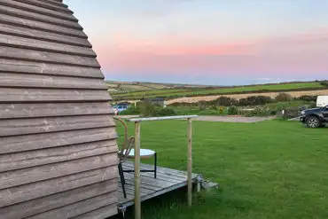 Camping pod with sunset