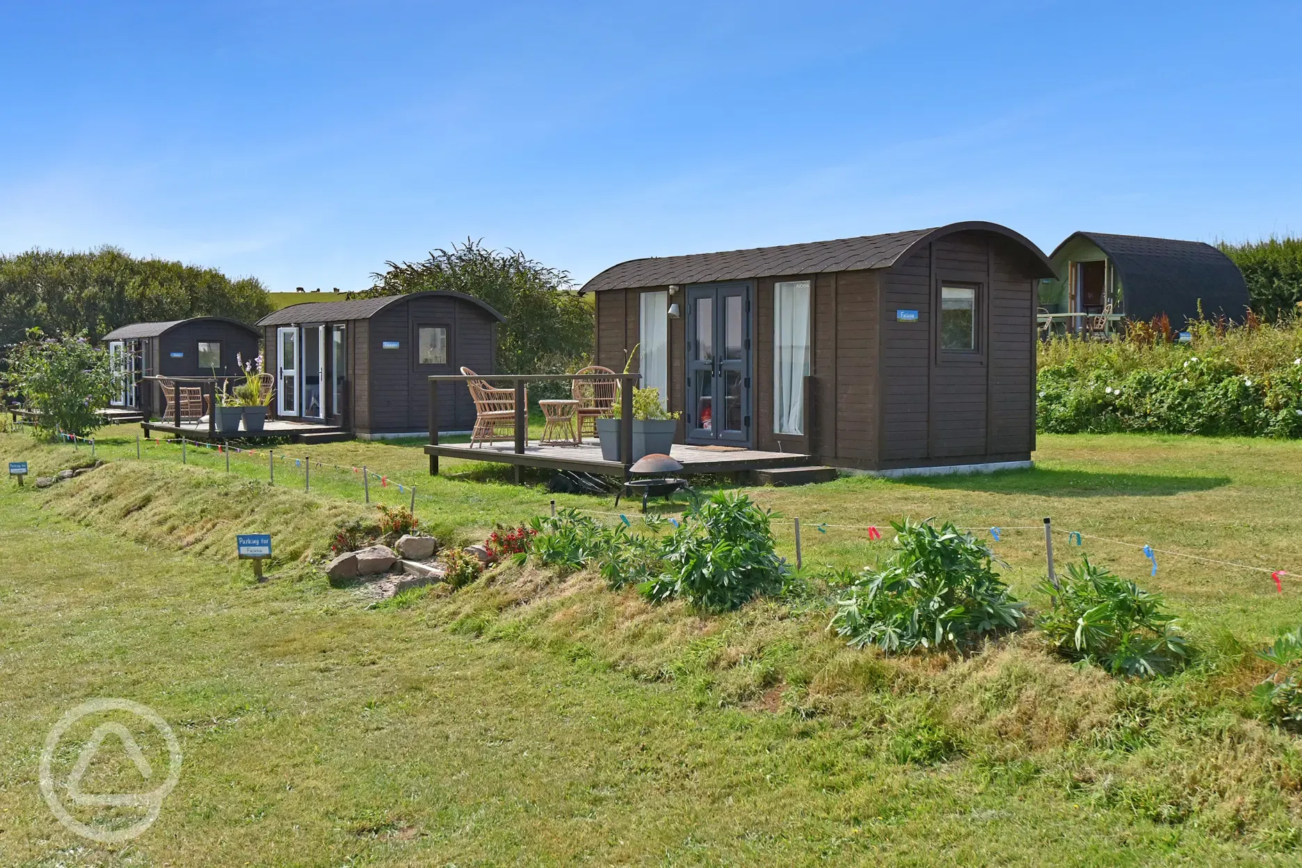 Dahlia, Lavender and Fuchsia large glamping pods 