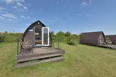 Daisy, Jasmine, and Lily camping pods with a small deck area Daisy, Jasmine, and Lily camping pods with a small deck area