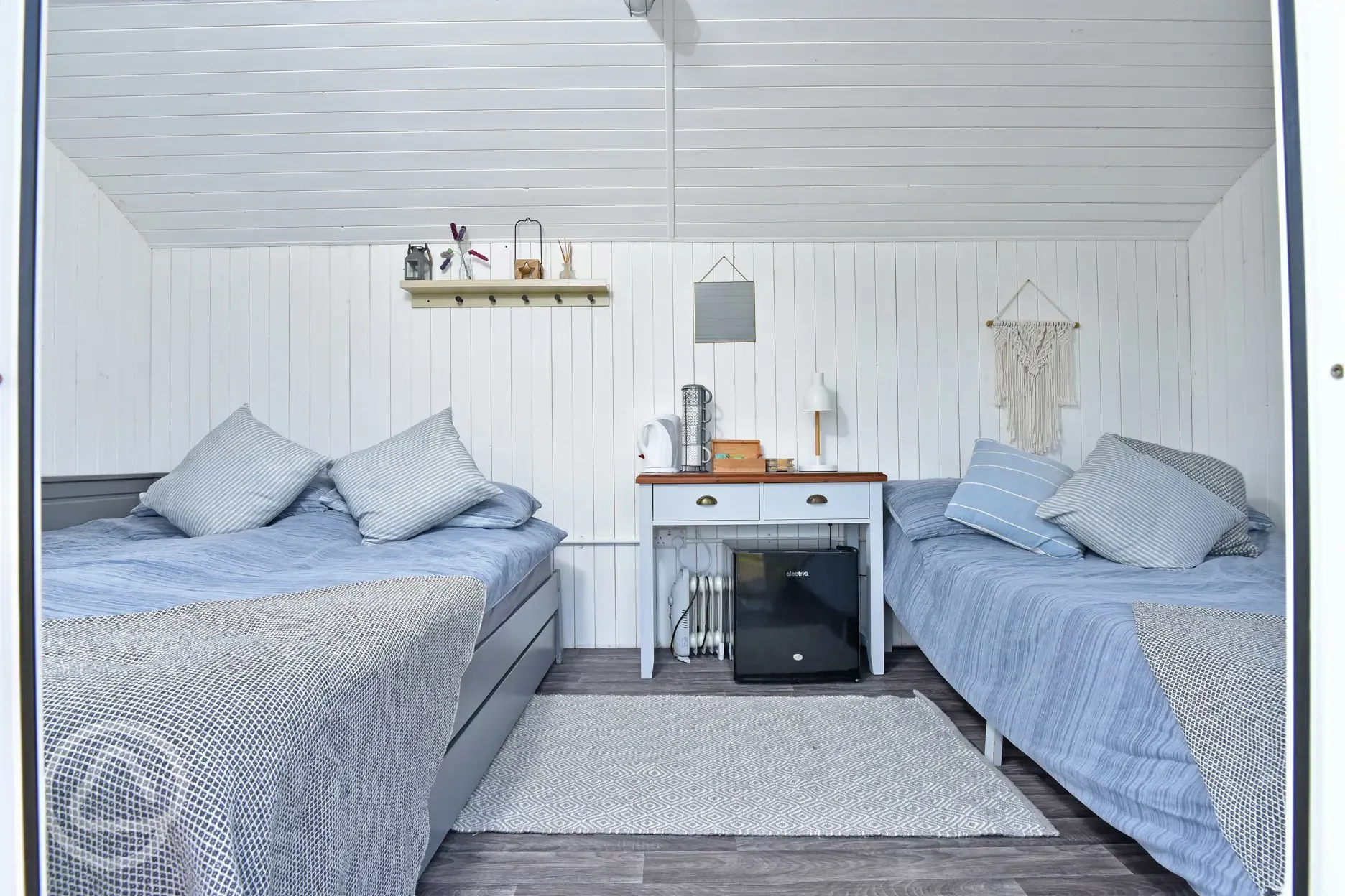 Lavender glamping pod beds