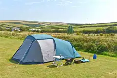 Non electric grass pitches with countryside views Non electric grass pitches with countryside views