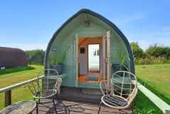 Sweet Pea camping pod with an outdoor deck and seating Sweet Pea camping pod with an outdoor deck and seating