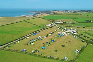 Aerial of Little Roadway Farm Camping Park and the coast