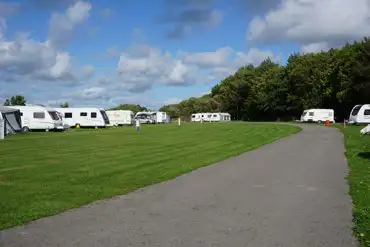 Well kept grass pitches Llandow Caravan and Camping Park