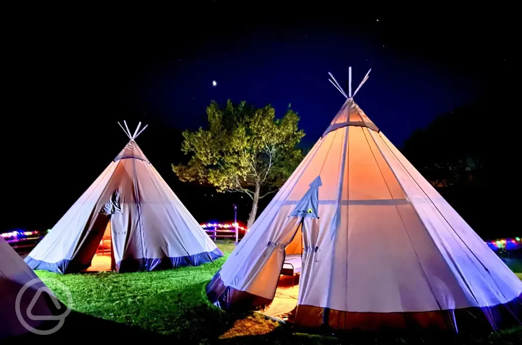 Giant Tipis at night